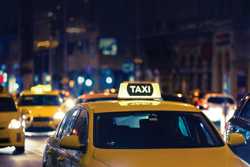 Taxi on nigh city street