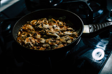 Roast the mushrooms in an old dirty frying pan