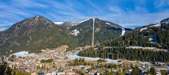 Fototapeta premium Winter landscape of Pozza di Fassa, a commune in Trentino at the northern Italia. Val di Fassa, Dolomiti