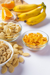 cereals with milk on white background