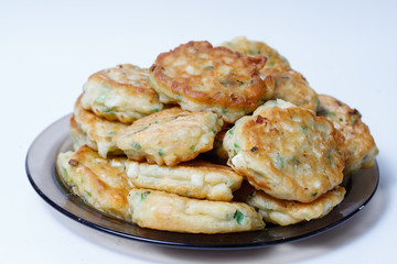 Fried pastry with egg and green onion