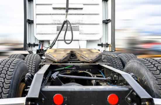 Back View Of Big Rig Semi Truck Tractor With Fifth Wheel And Chassis