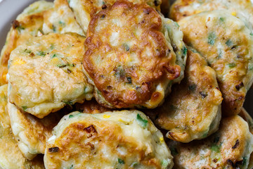 Fried pastry with egg and green onion