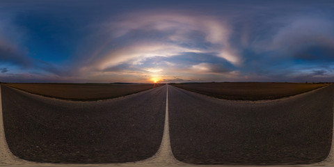 Full spherical seamless panorama 360 degrees angle view on no traffic asphalt road among fields in...