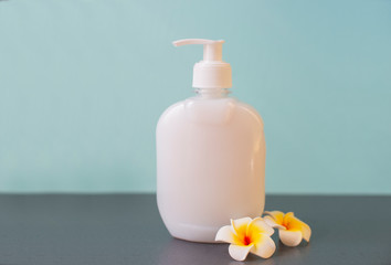 
liquid cosmetic soap dispenser with mango flower for disinfection and hand washing