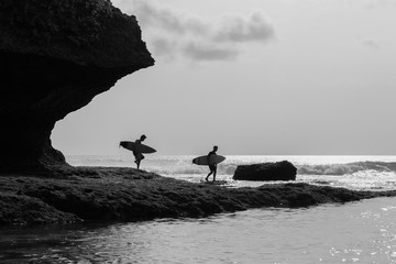 Surfers going for some tubes in Bali.
