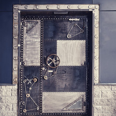 Iron door in a futuristic style. Armored door made of metal, fantasy of the future