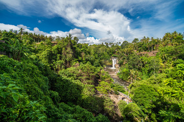 Fototapeta na wymiar Bali, Indonesia - February, 2020: Tegenungan Waterfall is a beautiful waterfall located in plateau area and it is one of places of interest of Bali