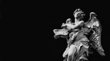 Angel statue holding Jesus Inri sign. A 17th century baroque masterpiece at the top of Sant'Angelo...