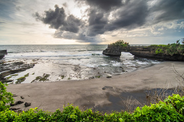 Bali, Indonesia - February, 2020: Tanah Lot means Land Sea in Balinese language Located in Tabanan....