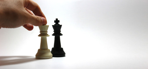 hand holding chess board