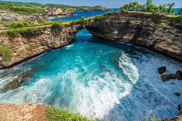 Panoramic view of broken beach in Nusa Penida, Bali, Indonesia. Blue Sky, Turquoise Water.