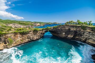 Panoramic view of broken beach in Nusa Penida, Bali, Indonesia. Blue Sky, Turquoise Water.