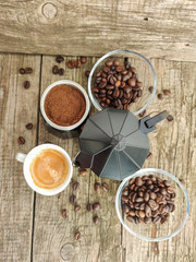 Cup and grain of coffee