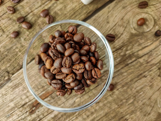 Cup and grain of coffee