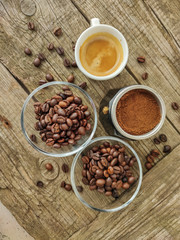 Cup and grain of coffee