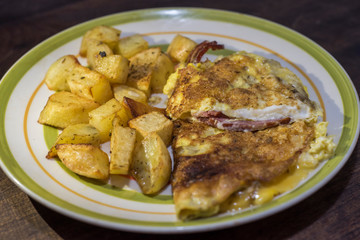 exquisite omelette with bacon and Argentine fries