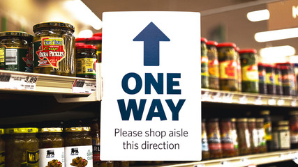 One Way Sign In A Supermarket