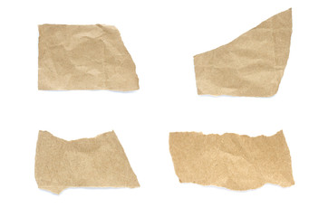 torn paper isolated on white background. Brown paper torn or ripped pieces of paper isolated on white background.