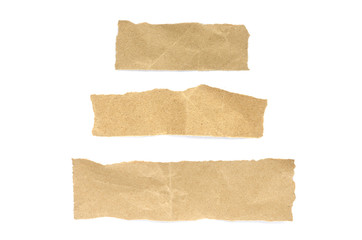 torn paper isolated on white background. Brown paper torn or ripped pieces of paper isolated on white background.