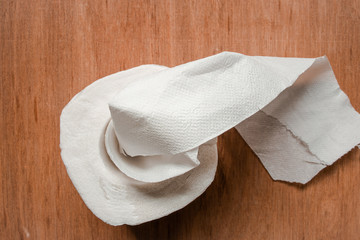 White tissue on wood background.