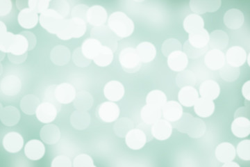 Abstract bokeh lights with soft light background