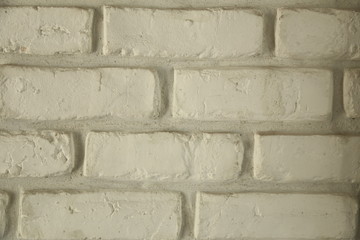 Fond de mur en briques beiges 
