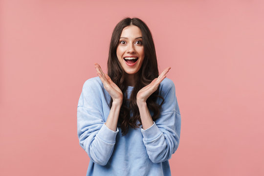 Image Of Young Woman With Long Brown Hair Smiling And Raising Hands