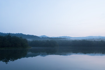 Fototapeta na wymiar Beautiful nature and fog on the reservoir at Jedkod-Pongkonsao Natural Study in Saraburi Thailand
