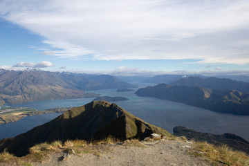 New Zealand landscape background. Roys peak mountain hike in Wanaka New Zealand. Popular tourism travel destination. Hiking travel and adventure. 