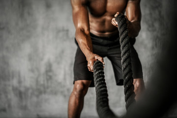 Battle ropes exercise - Powered by Adobe