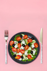 Green salad with tomato and fresh vegetables