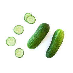 Fresh cucumber and sliced cucumber isolated on white background