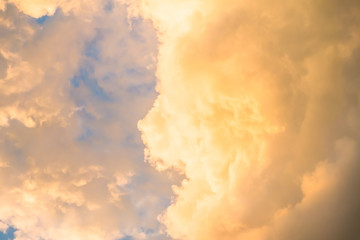 Beautiful gold color clouds on sky background