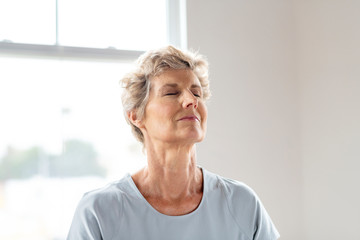 Fototapeta na wymiar Senior lady doing yoga
