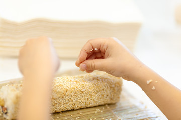Girl makes sushi at the culinary master class