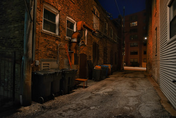 Naklejka na ściany i meble Dark and eerie urban city alley at night 