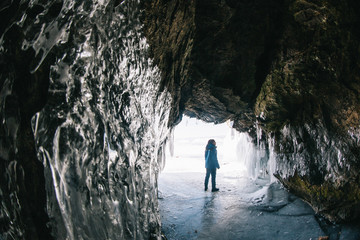 Man in an ice cave on Baikal