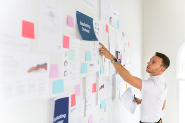 Business person working with notes
