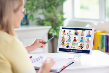 Online remote learning. Teacher with computer.