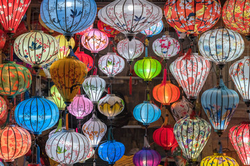 Colorful lanterns spread light on the old street of Hoi An Ancient Town - UNESCO World Heritage...