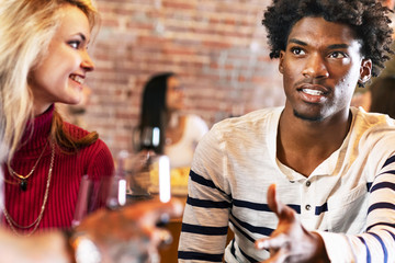 Friends drinking wine together