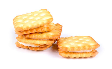 Cream cracker biscuits on white background.