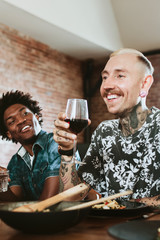 People socializing in a house party