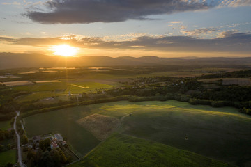 Aerial view of rural Isère with forest and houses