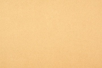 Fototapeta na wymiar Brown cardboard sheet of paper background