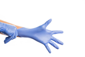Obraz premium Hands of people puts on medical colorful rubber gloves, isolate on white background