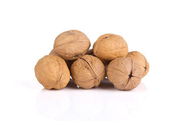 Walnuts on a white board