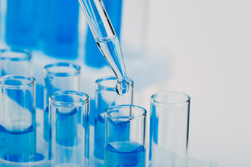 A pipette that adds fluid to one of several tubes. Lab tests