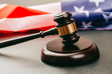 law gavel and USA america flag - American crime concept